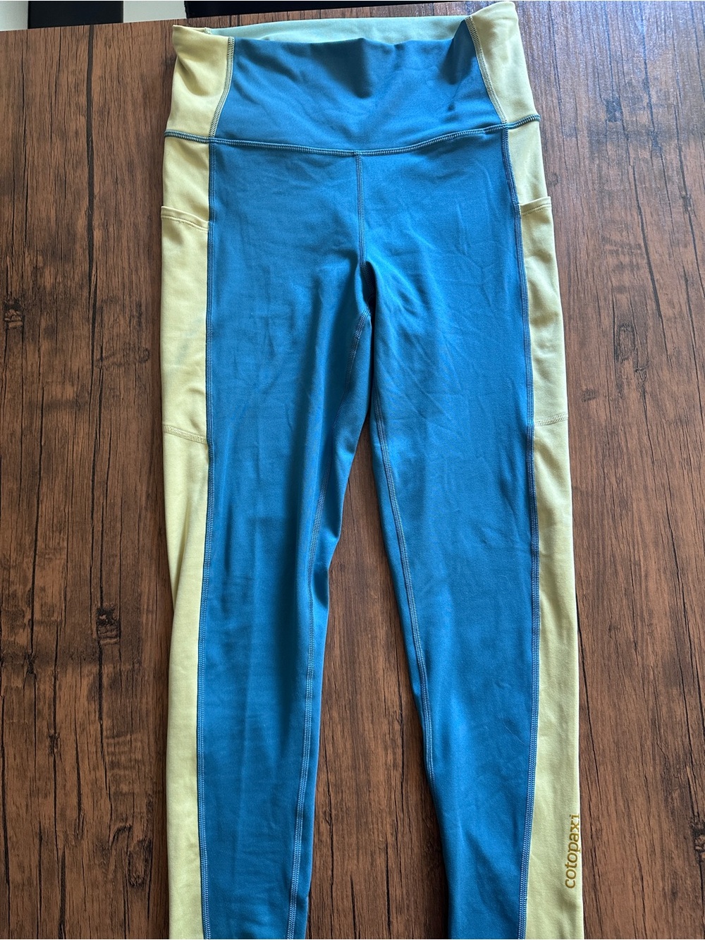 Cotopaxi Teal and Yellow Athletic Leggings